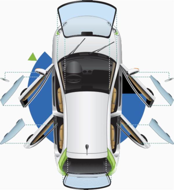 An aerial view of a car with its doors open