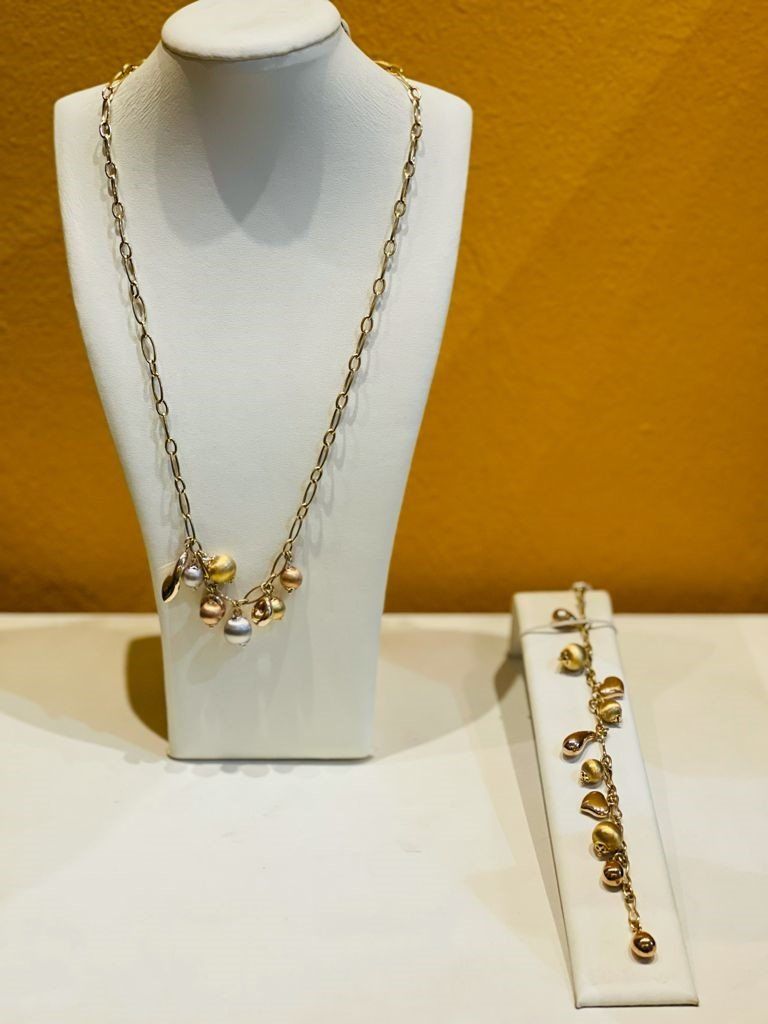 collana e bracciale in oro giallo