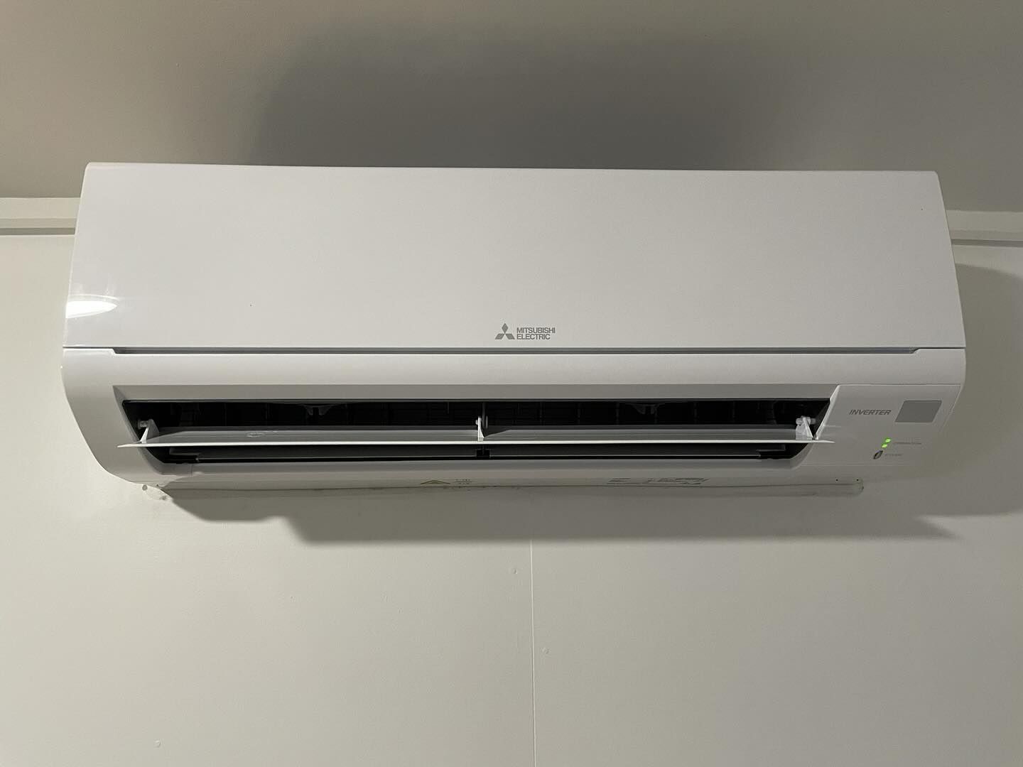 A White Split Type Air Conditioning Unit