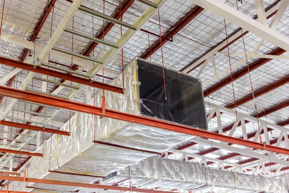 There Are Many Ducts Hanging From the Ceiling of a Building — The Cool Guys In Holtze, NT
