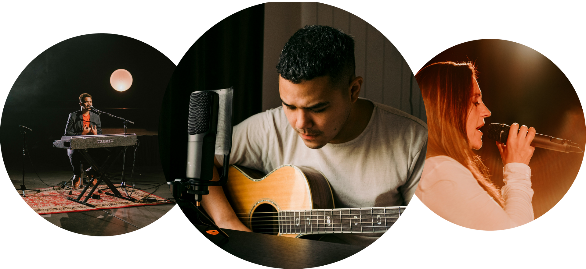 A man is playing a guitar and a woman is singing into a microphone.