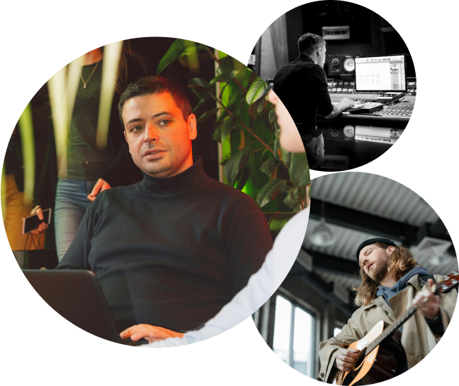 A man sitting at a desk with a laptop and a man playing a guitar