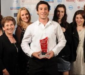 A group of women are posing for a picture in a pharmacy