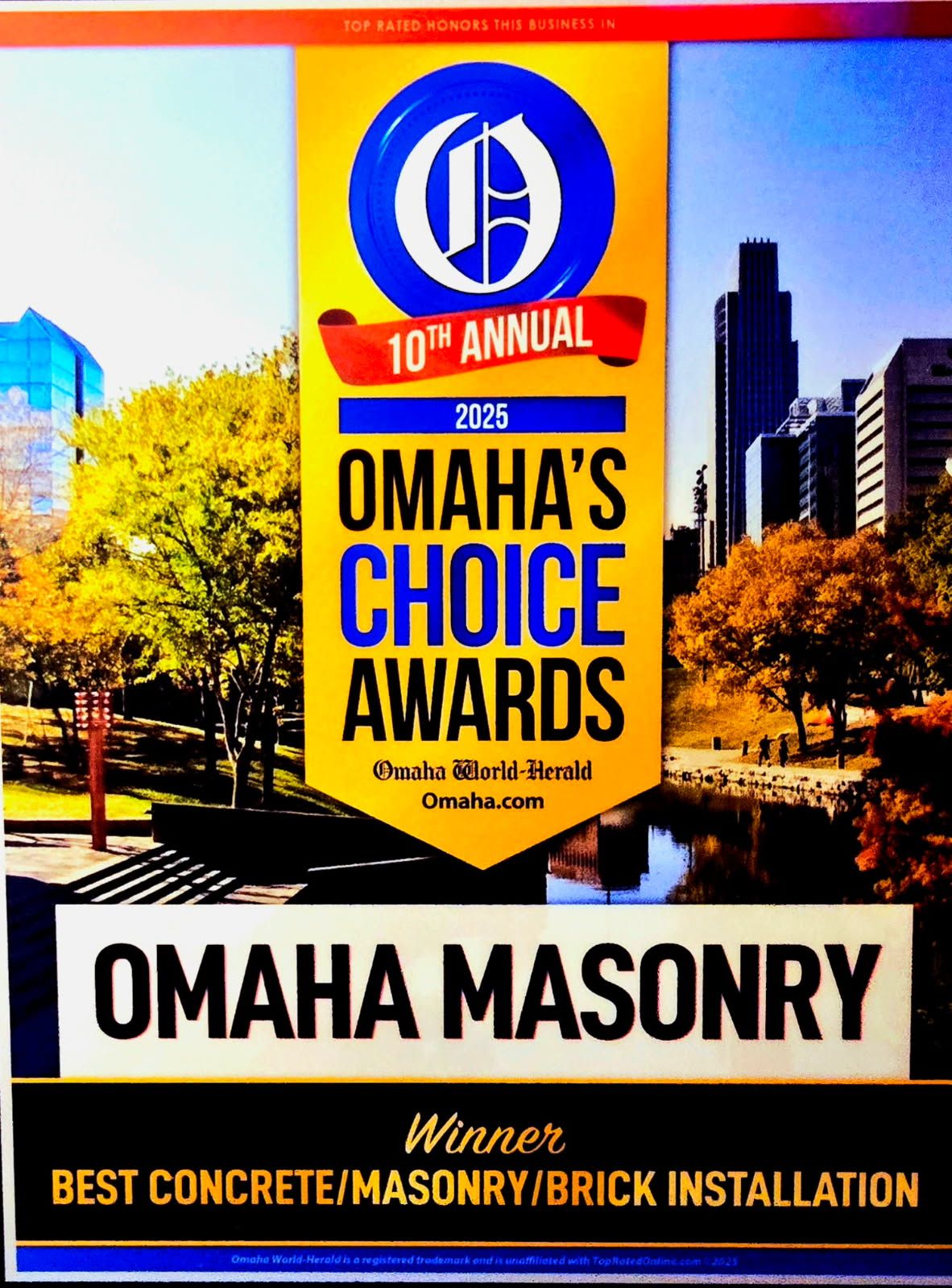 Graphic awarding Omaha Masonry an award for best concrete/masonry/brick installation