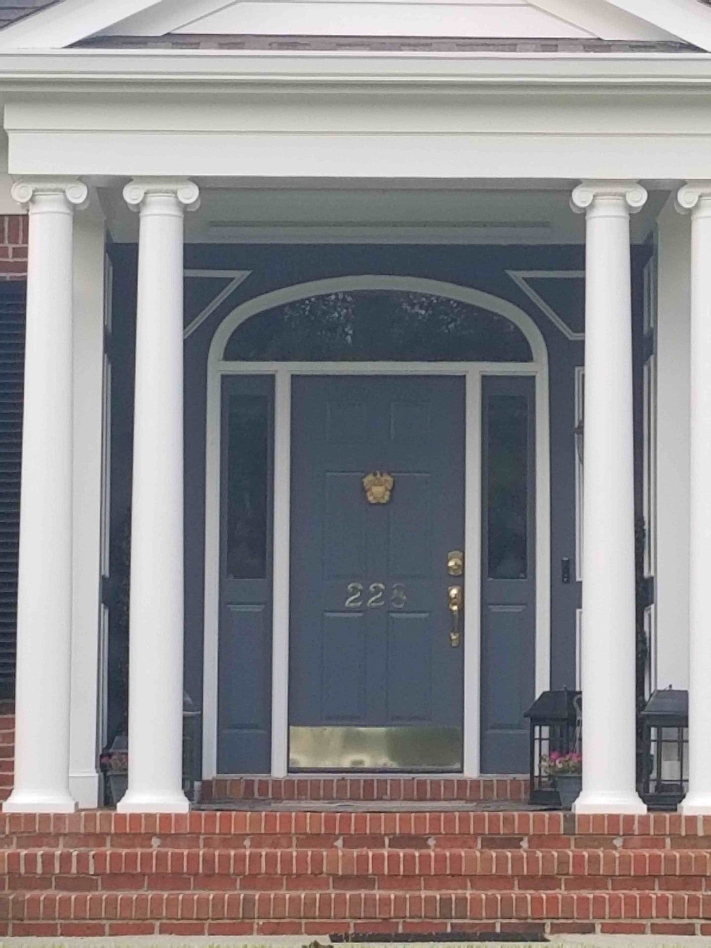 A blue door with the number 28 on it