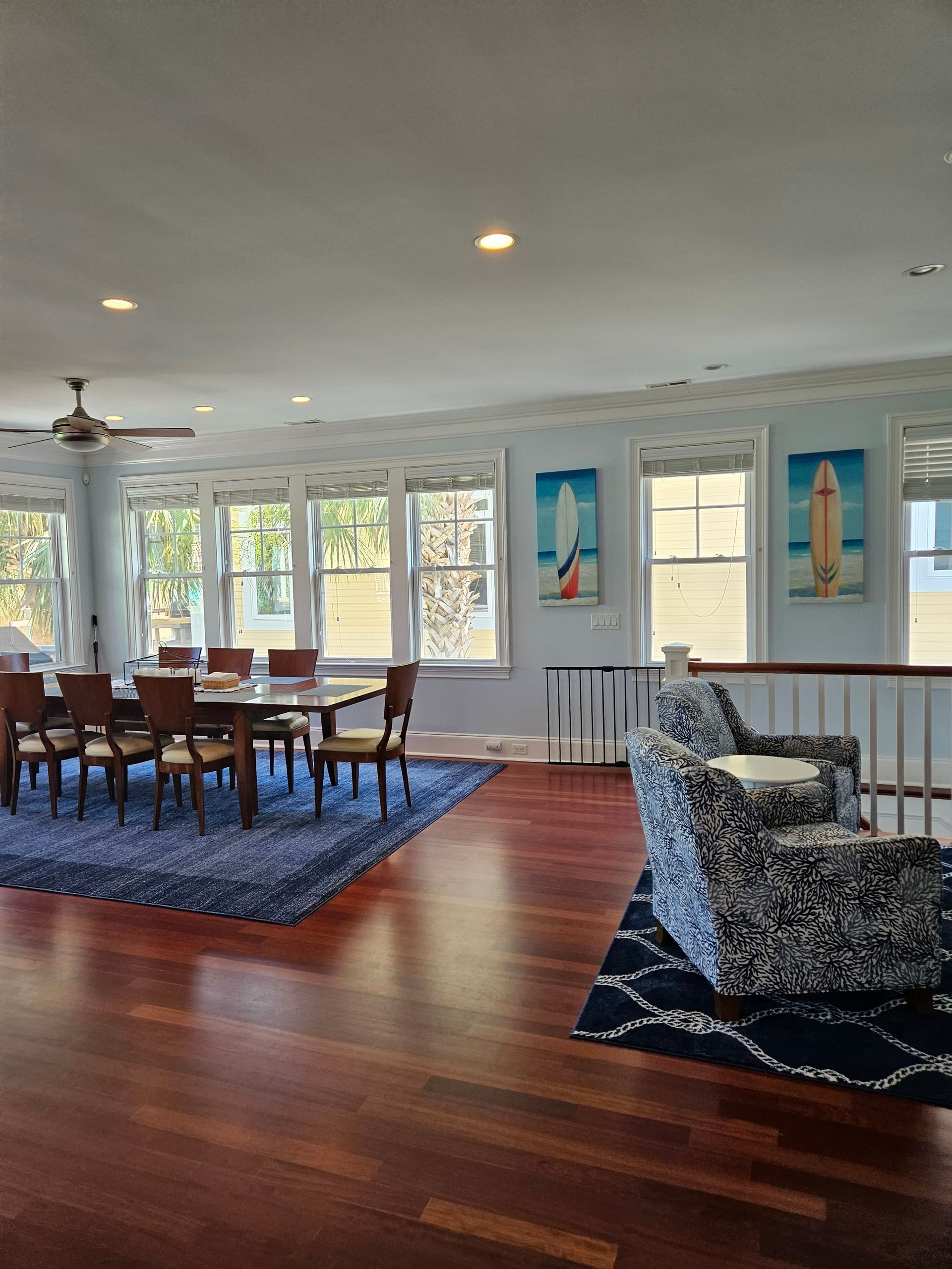 A large room with a dining table and chairs