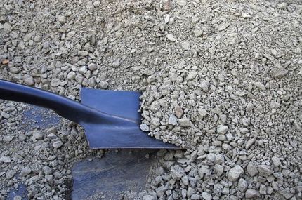 A Shovel Is Sitting On Top Of A Pile Of Gravel - Top-Quality Landscape Supplies in Byron Bay, NSW