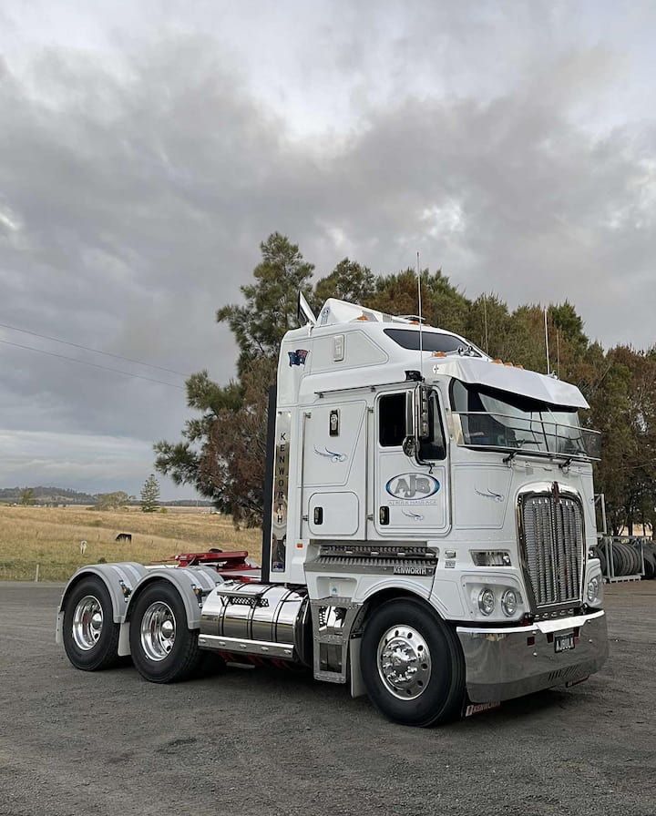 A White Semi Truck is Parked in a Parking Lot — Andrew Johnston Haulage In Clunes, NSW