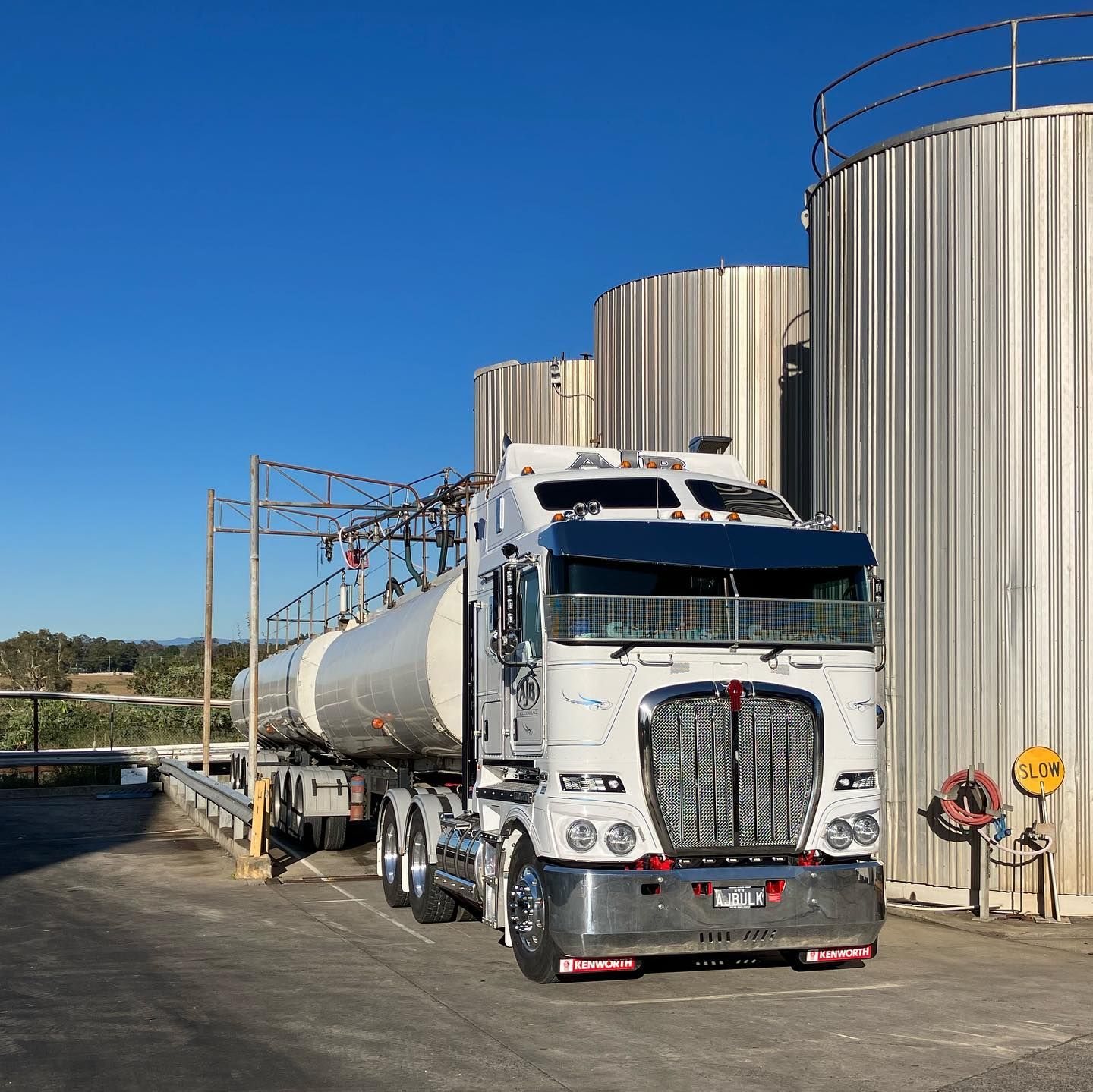 Two Semi Trucks Are Parked Next To Each Other — Andrew Johnston Haulage In Gold Coast, QLD