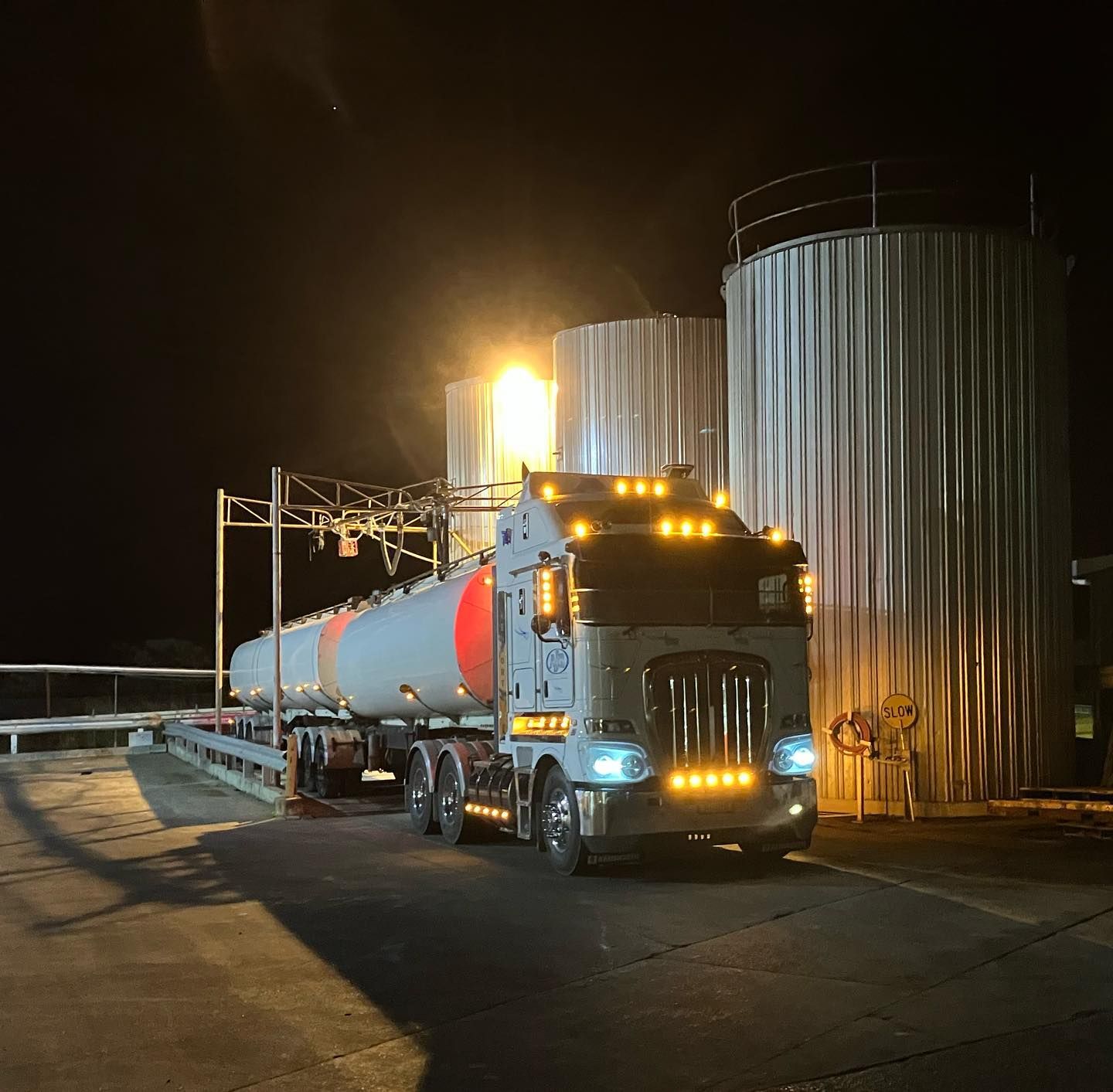 A White Volvo Truck Is Parked On The Side Of The Road — Andrew Johnston Haulage In Lennox Head, NSW