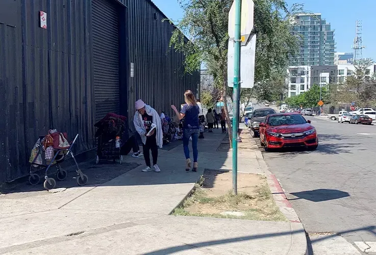 Del Mar Dental staff helping homeless people on the street.