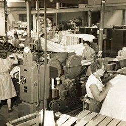 an old photo of laundry experts at work