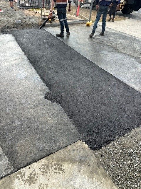 A Close Up Of A Trench Reinstatement On The Road — Elite Bitumen & Asphalt In Mackay, QLD