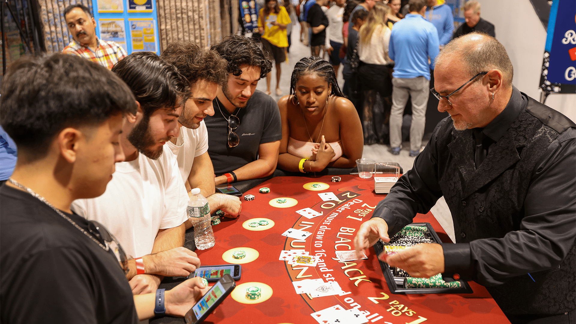 Students around a blackjack table