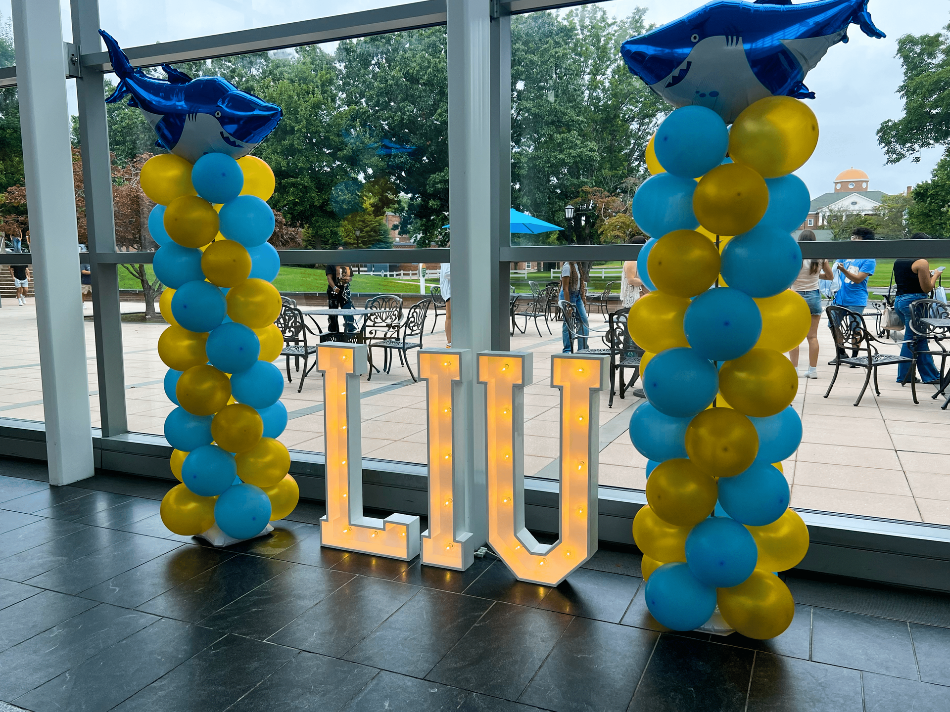 Custom LIU Marquee Letters with Beautiful Themed Balloon Towers
