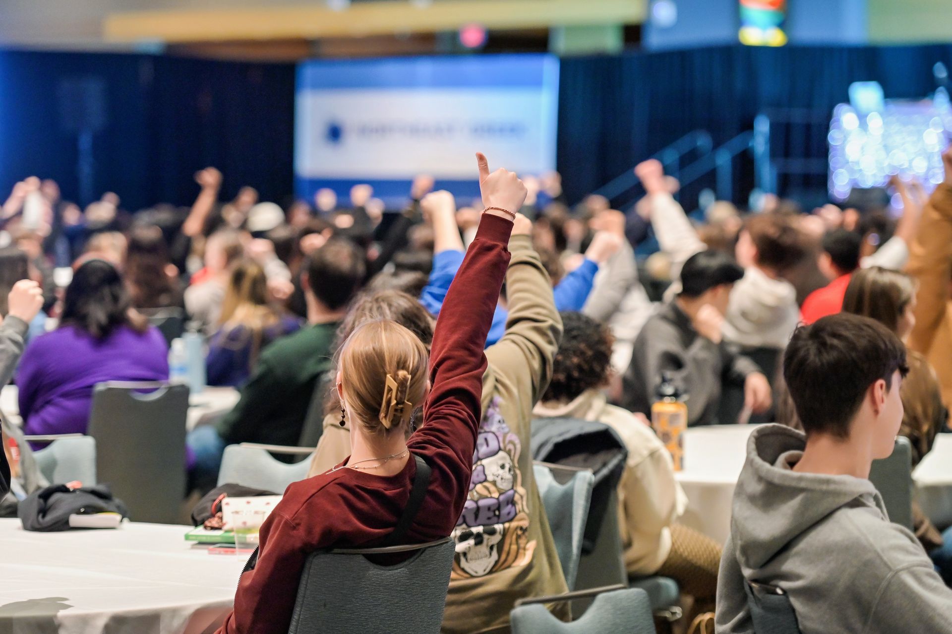 Corporate Conference Crowd with thumbs up