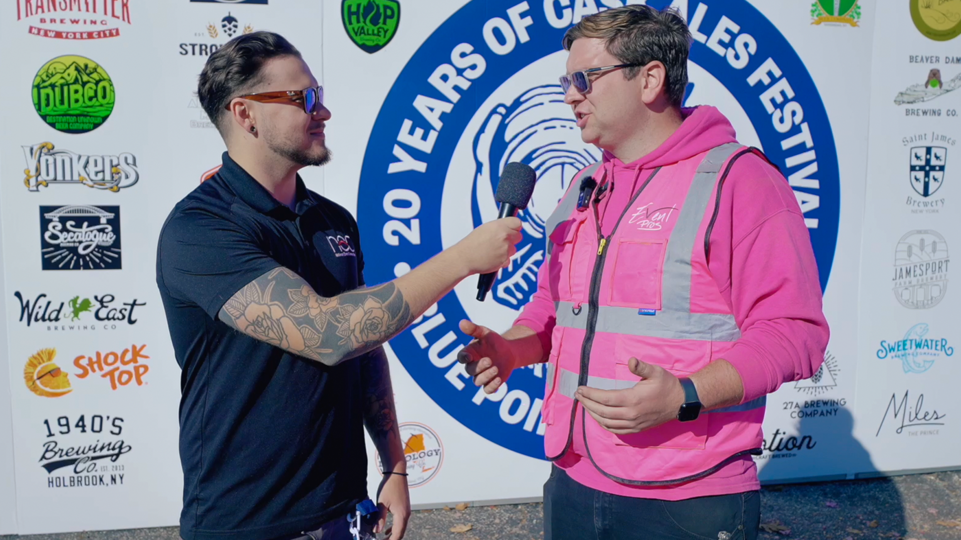 A man being interviewed at an event