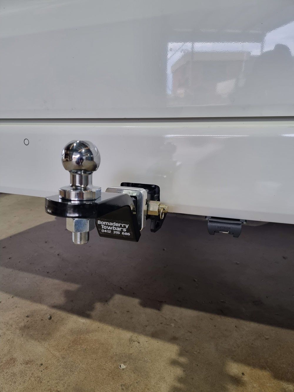 New Install Tow Ball On The Of The Car — Bomaderry Towbars & Mufflers In Bomaderry New South Wales