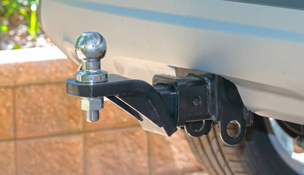 Tow Bar And Tow Ball On A Car — Bomaderry Towbars & Mufflers In Bomaderry New South Wales
