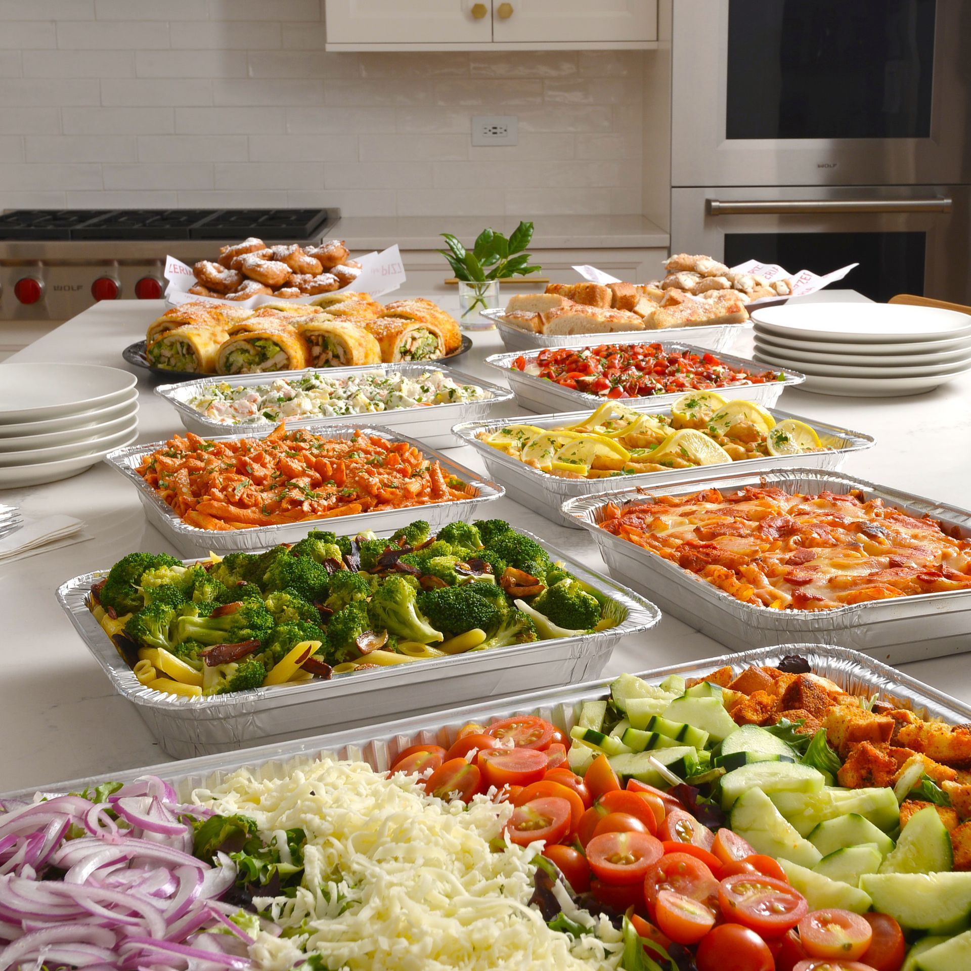 A buffet table filled with a variety of food