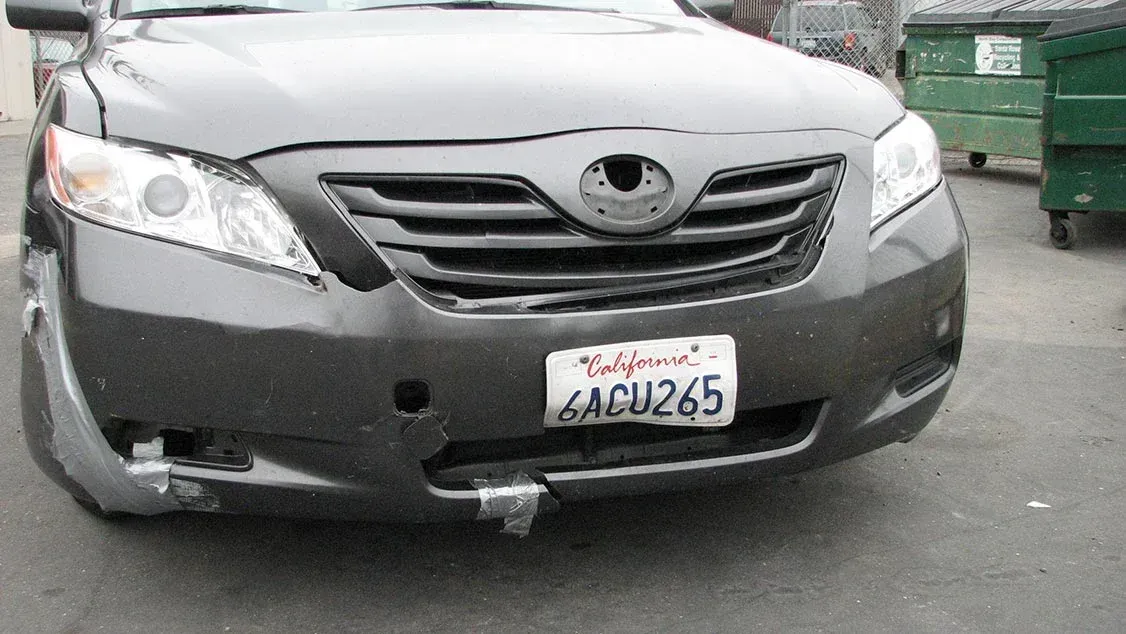 A Car With A License Plate That Says ACU265 — Santa Rosa, CA — Precision Frame and Body Shop