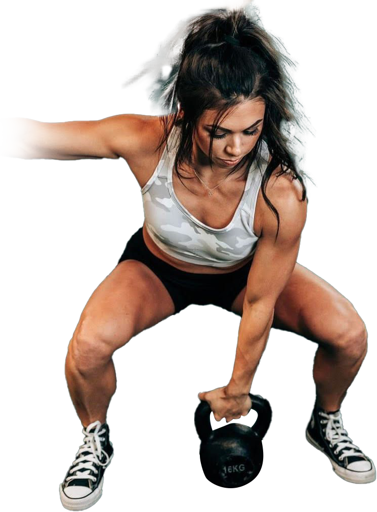A woman is squatting down while holding a kettlebell.