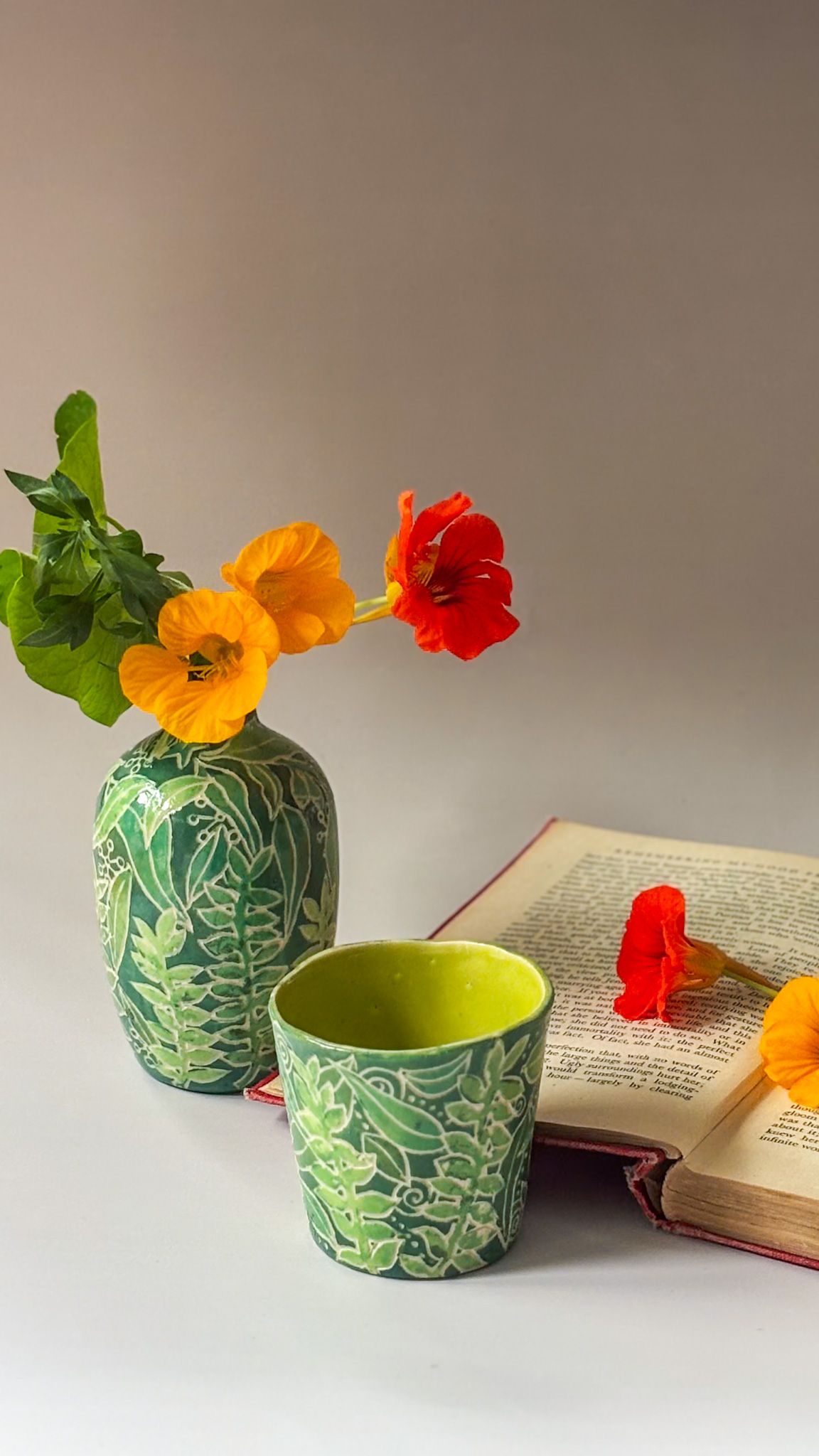 Logo of Rhianon Rose Ceramics in teal.