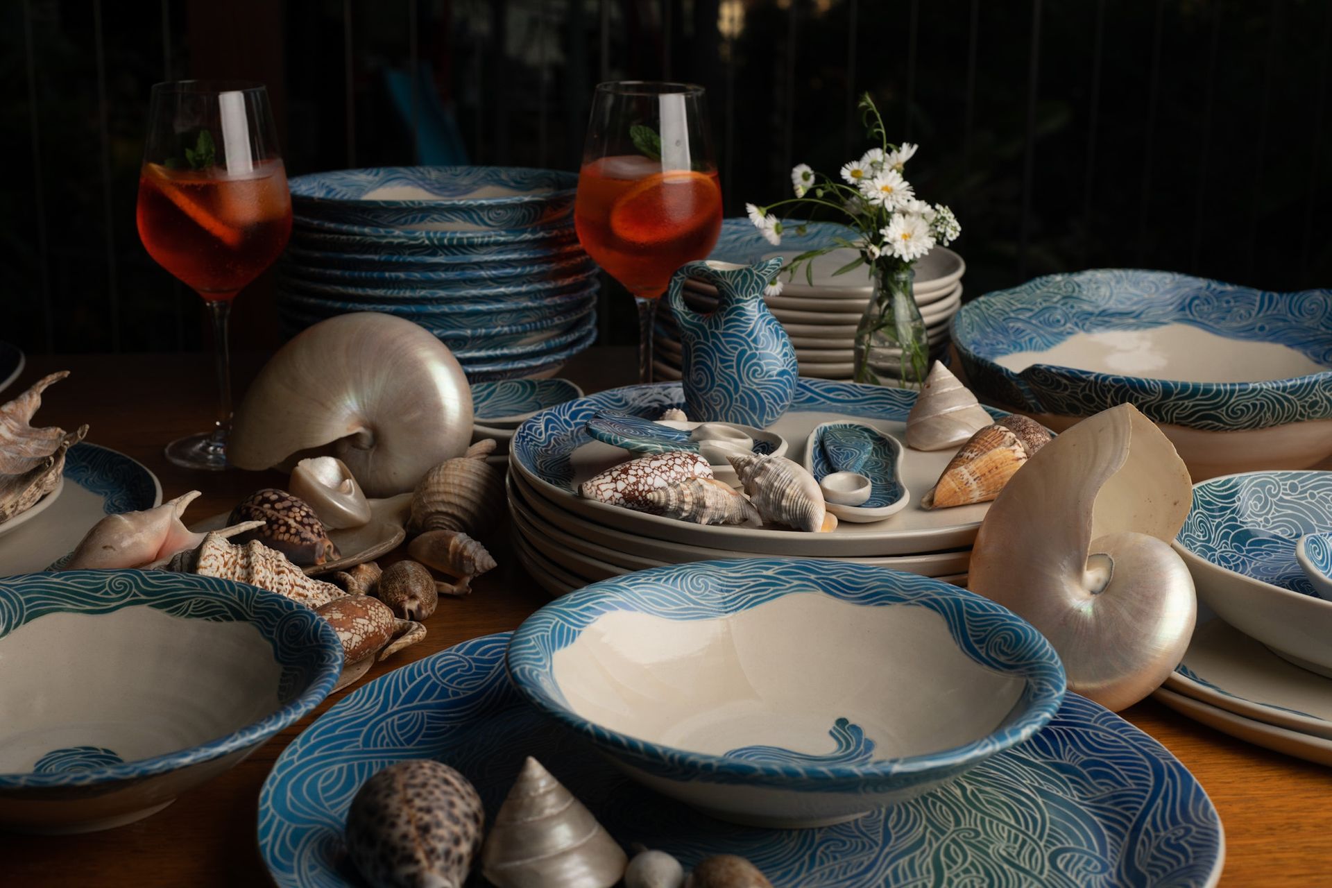 Brown ceramic plate with a black and white patterned bird design.