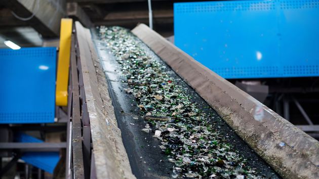 Conveyor in glass recycling facility