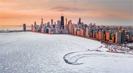 Chicago skyline in snow at sunrise