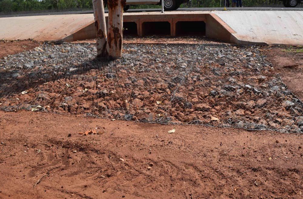 Metal Netting Surrounds Gravel at Culvert Construction Site — Coleman's Contracting & Earthmoving In Katherine, NT