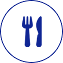 A dark blue icon inside a circular border, featuring a simple silhouette of a dining fork and a table knife.