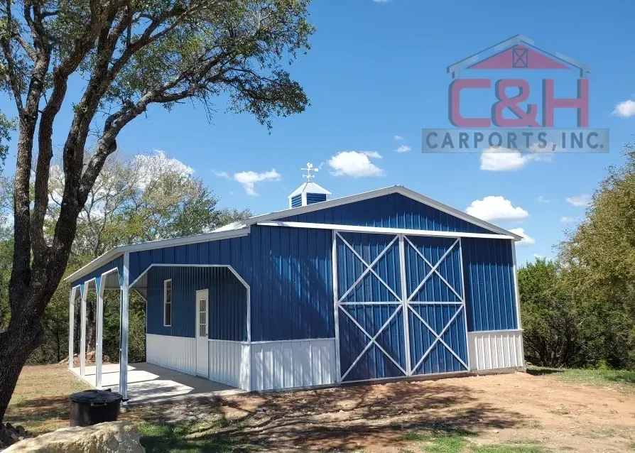 large blue and white barn