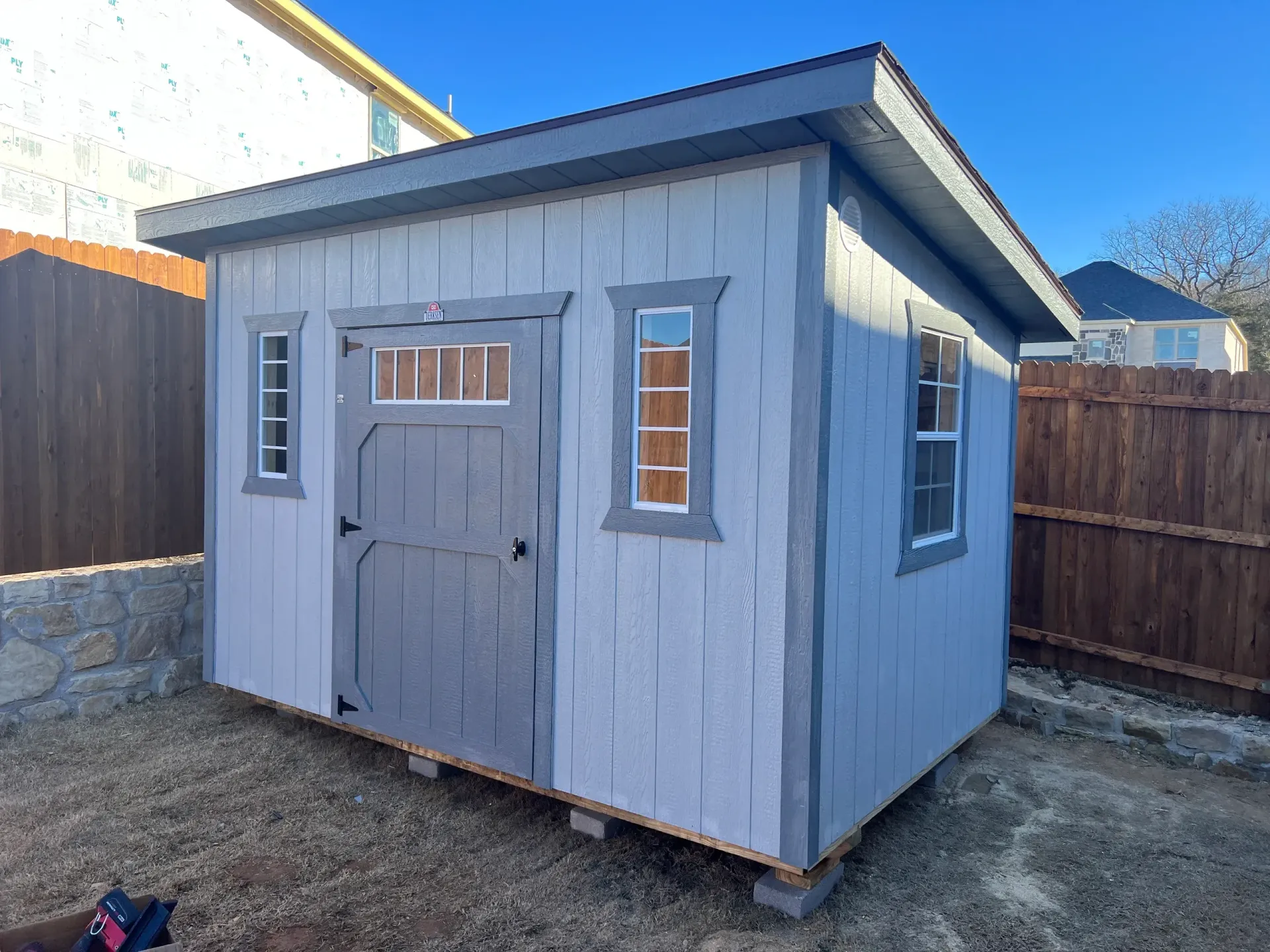 grey tool shed