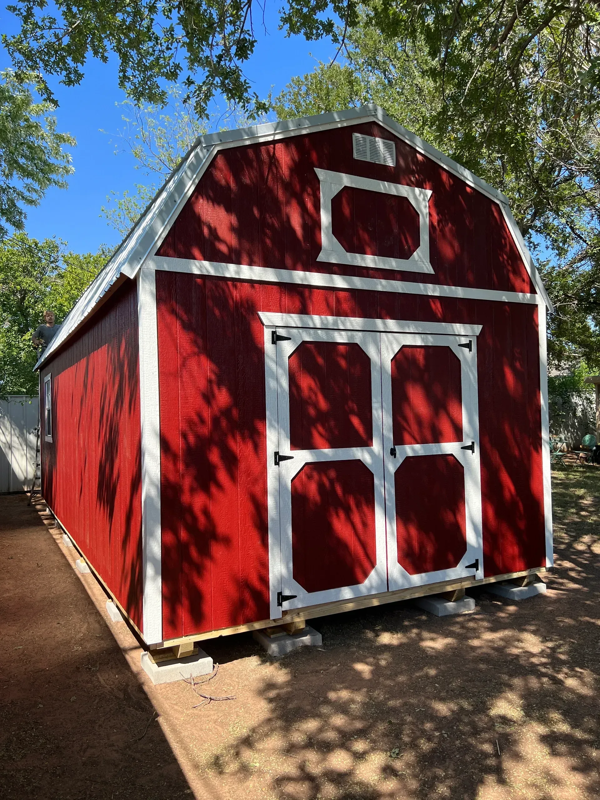 long red shed with double doors