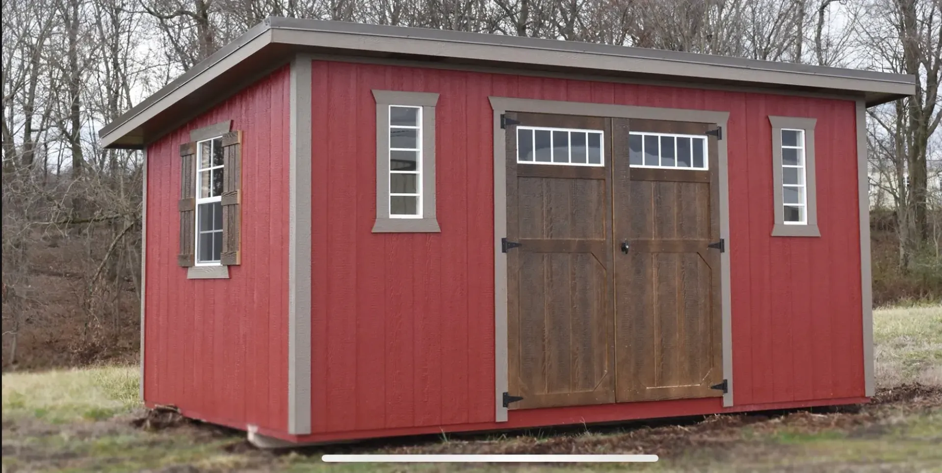 red shed with slanted roof