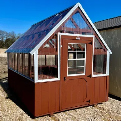small red greenhouse