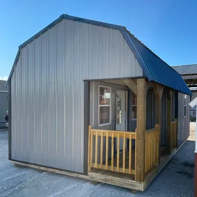 gray cabin with porch