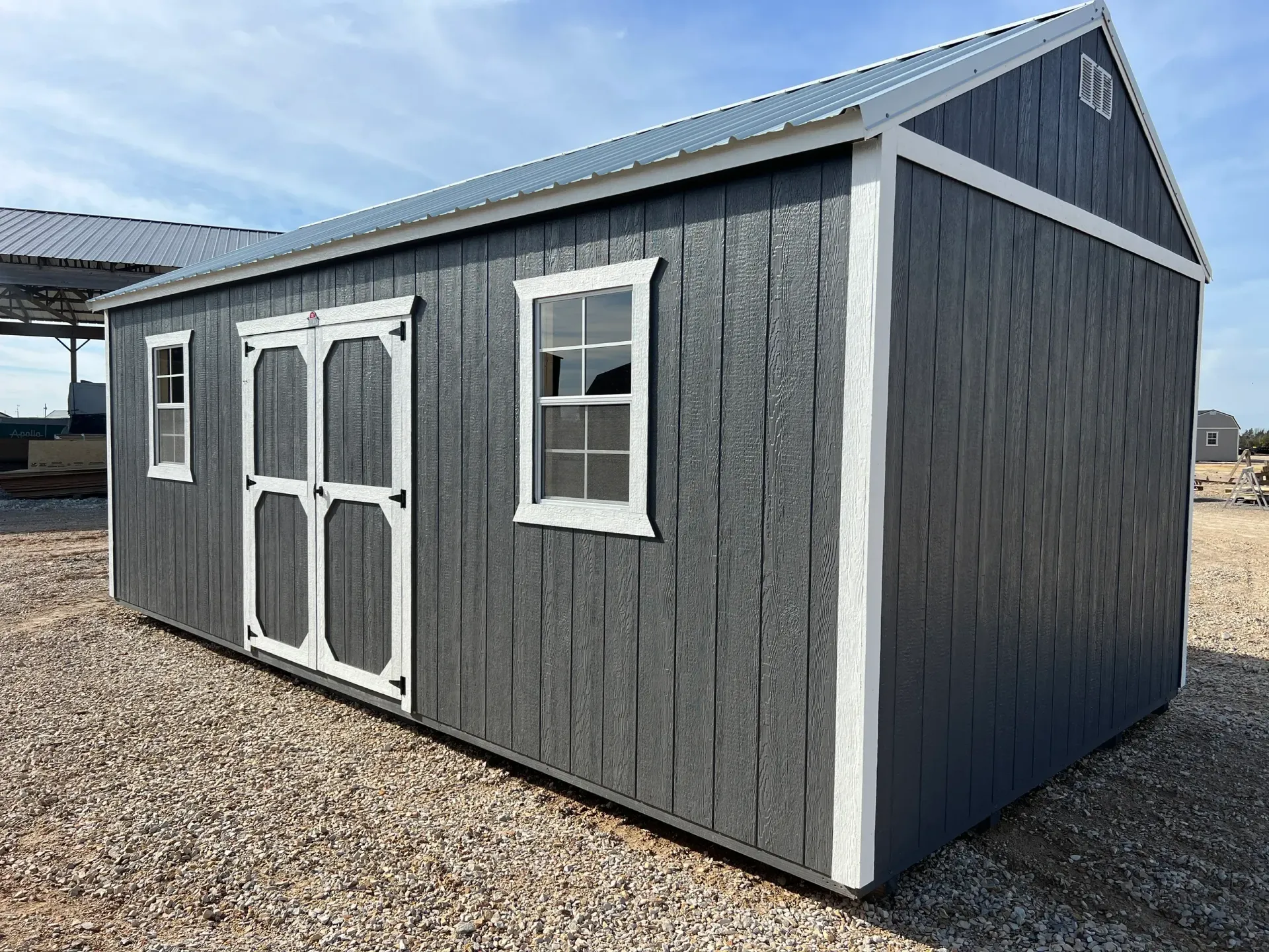 gray shed with double door
