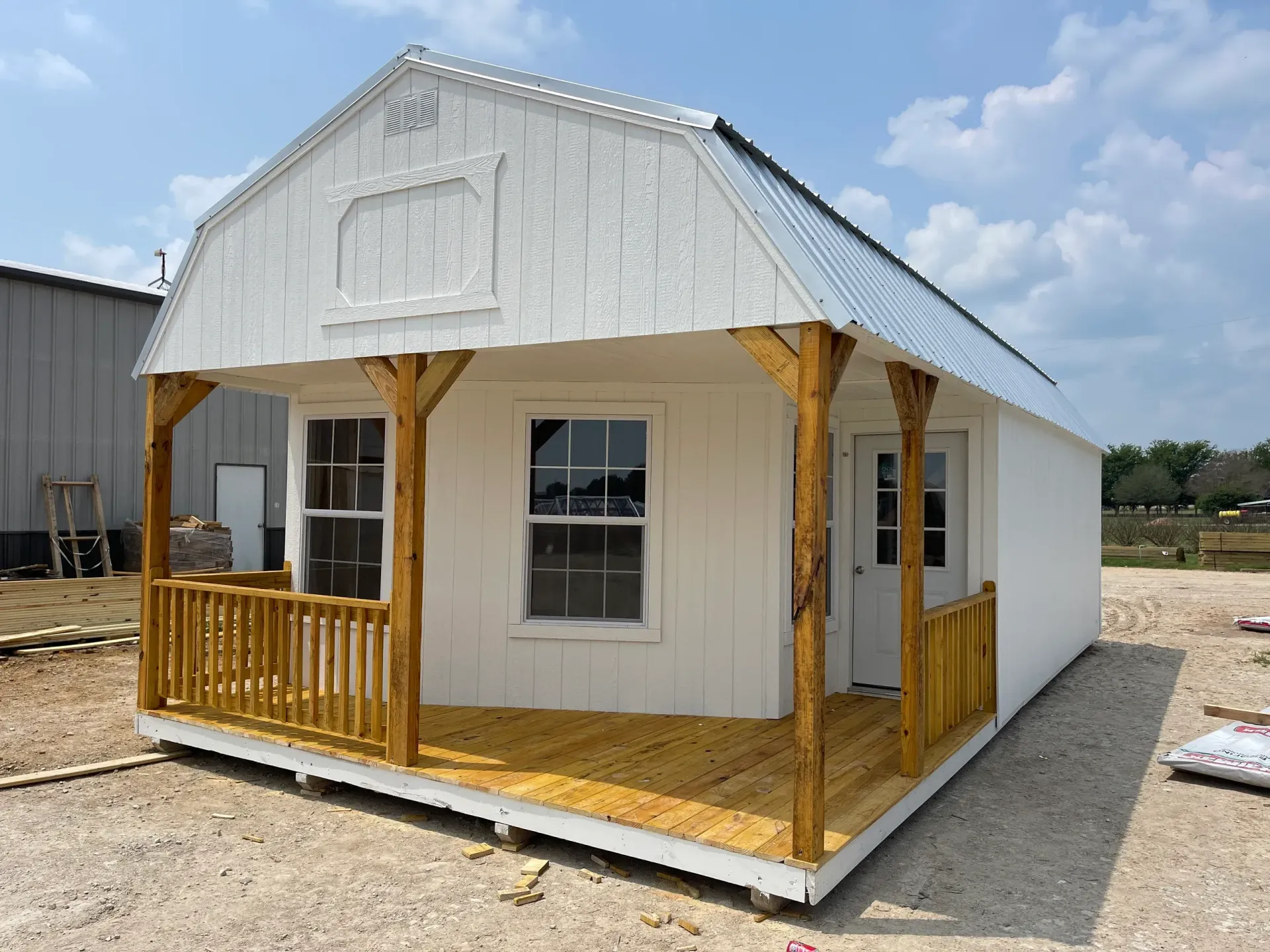 white cabin with porch