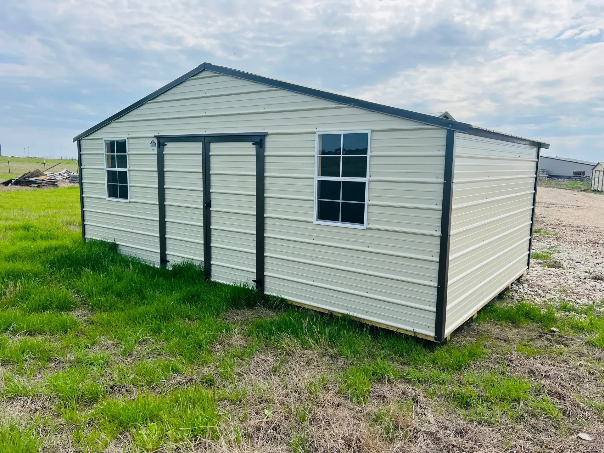 white metal shed with double doors