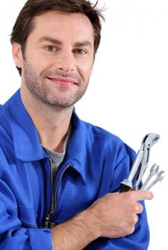 Worker Holding Tools