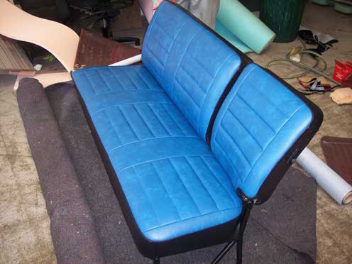 long blue and black car seat