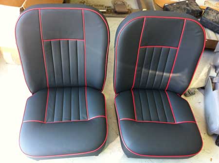 grey car seats with red lines