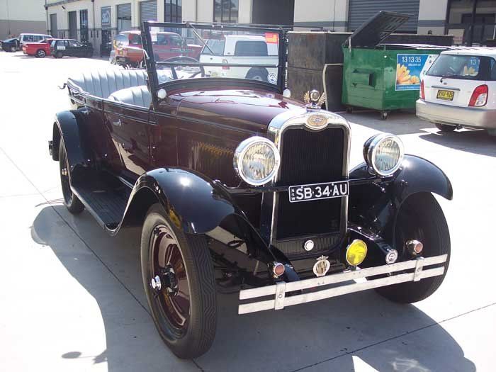 dark coloured vintage car