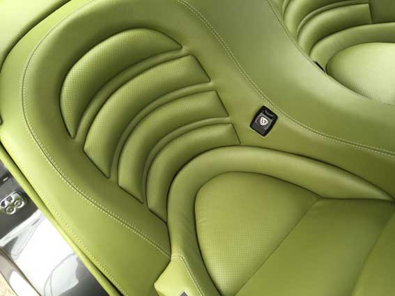 green padded car seat
