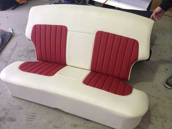 car seat with red and white material