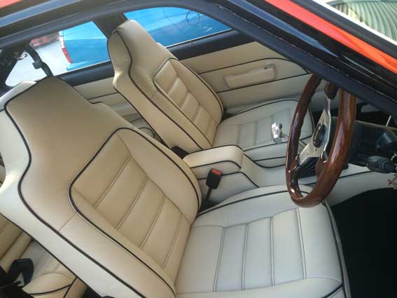 tan car seats with black lines