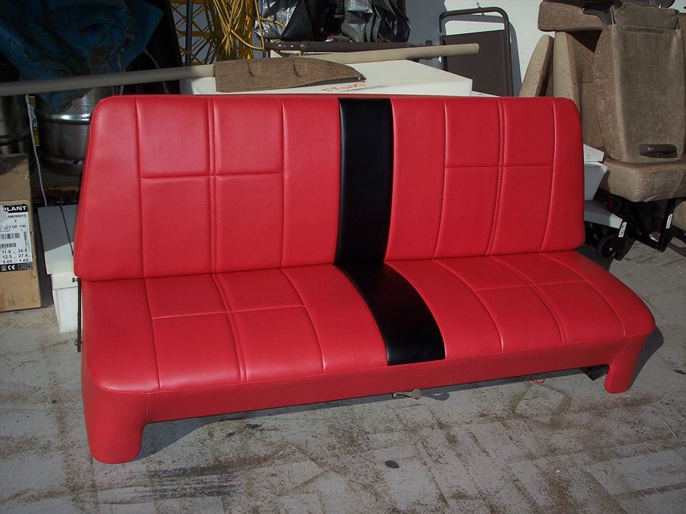red car seat with large black stripe