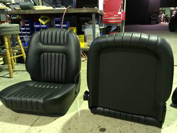 front and back of single black car seats